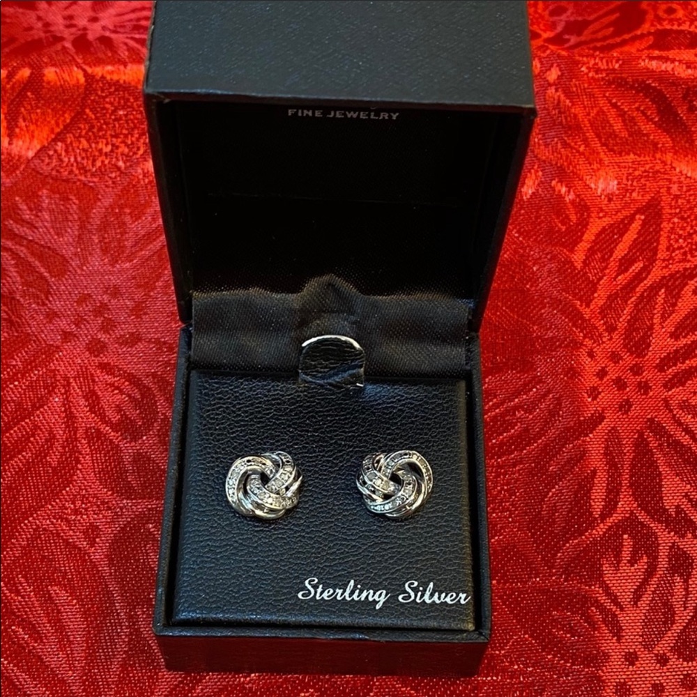 Diamond love knot stud earrings in Sterling silver
